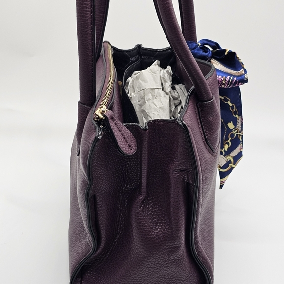 Burgundy Aldo small hand bag.
